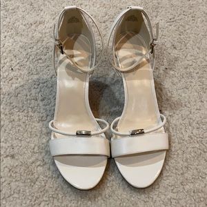 Nine West woman’s wedge sandal. Cream color